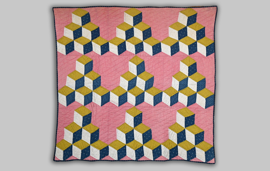 Unusual Adaptation of Tumbling Blocks Quilt