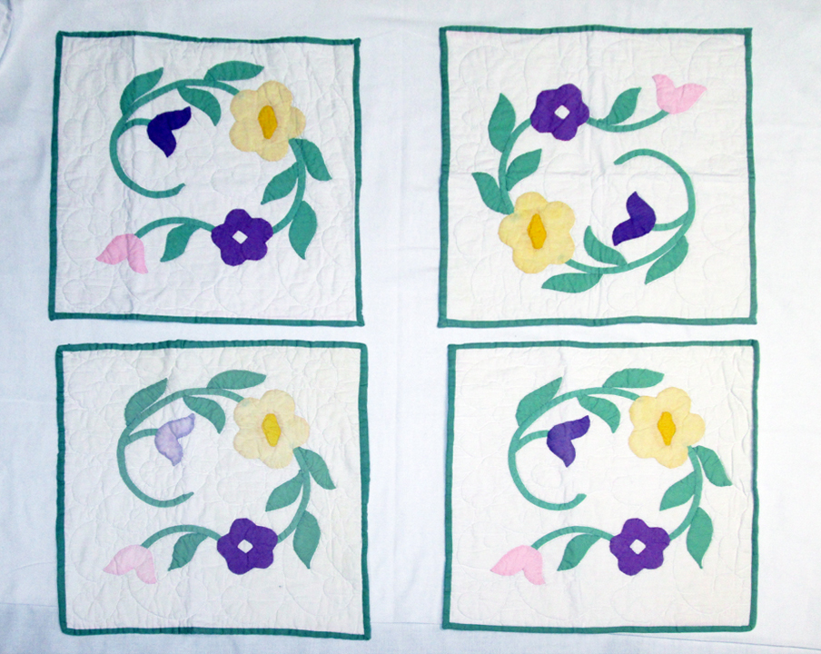 f160 Four Appliqued Floral Wreath fragments