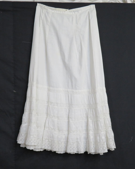 UF213 Early 20th century slip with cotton Fleur De Lis patterned trim